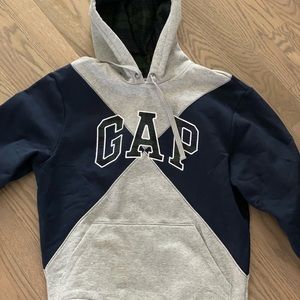 NWOT.  Never worn.  Men’s XS Gap GQ Opening ceremonies hoodie